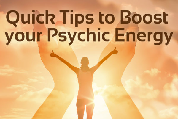 woman with hands up to sky, text at the top which says 'quick tips to boost your psychic energy'