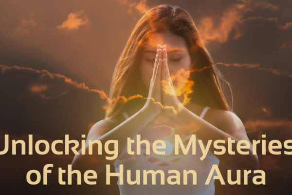 'unlocking the mysteries of the human aura' text with image of woman with praying hands and sunset in the background