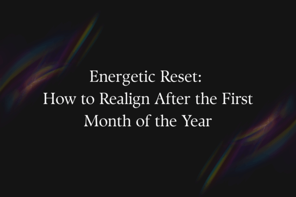 'Energetic Reset: How to Realign After the First Month of the Year' text with black background with rainbow details