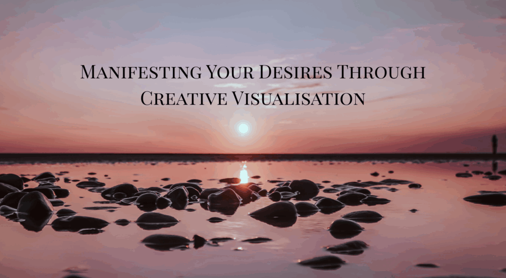 Manifesting Your Desires Through Creative Visualisation text with background of sea shore